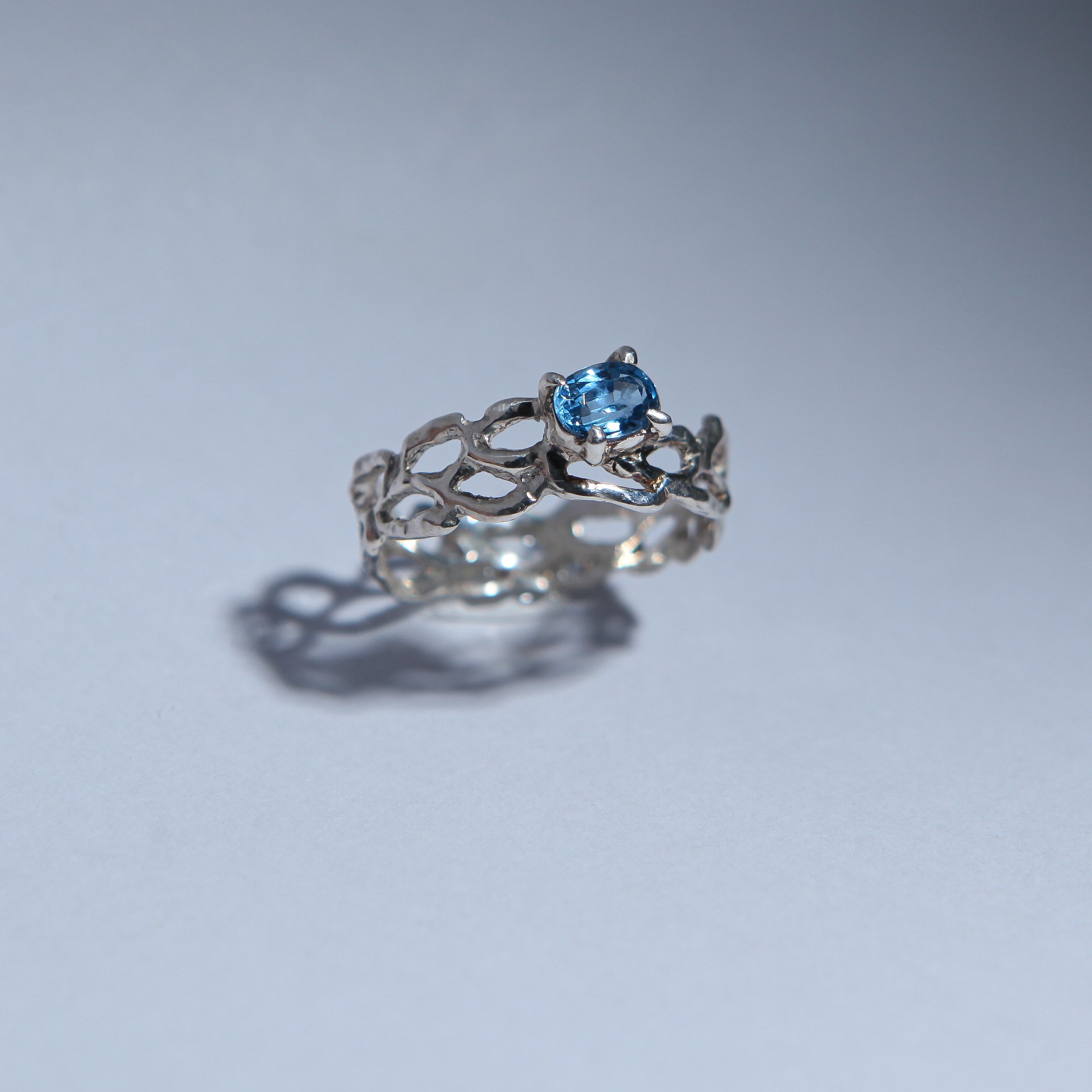 Lacey with blue zircon