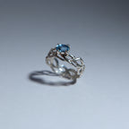 Lacey with blue zircon