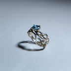 Lacey with blue zircon