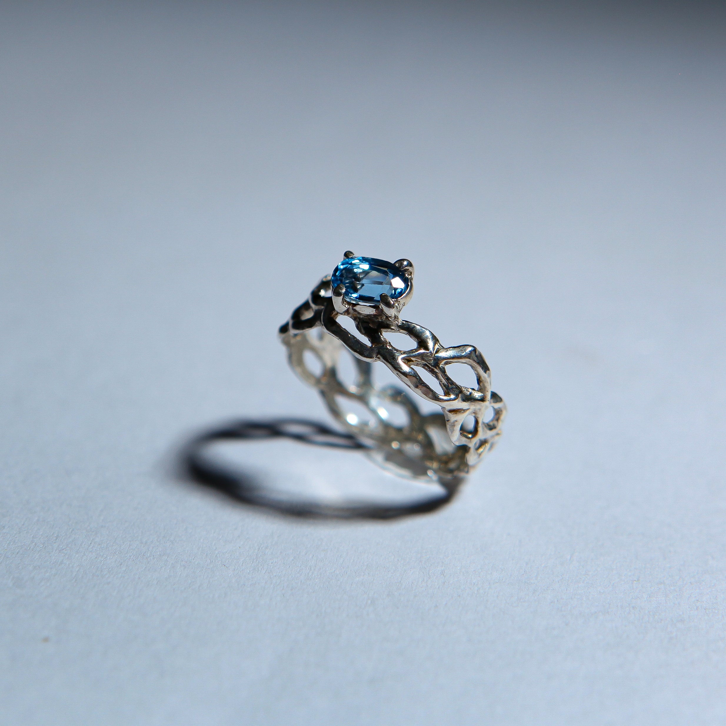 Lacey with blue zircon