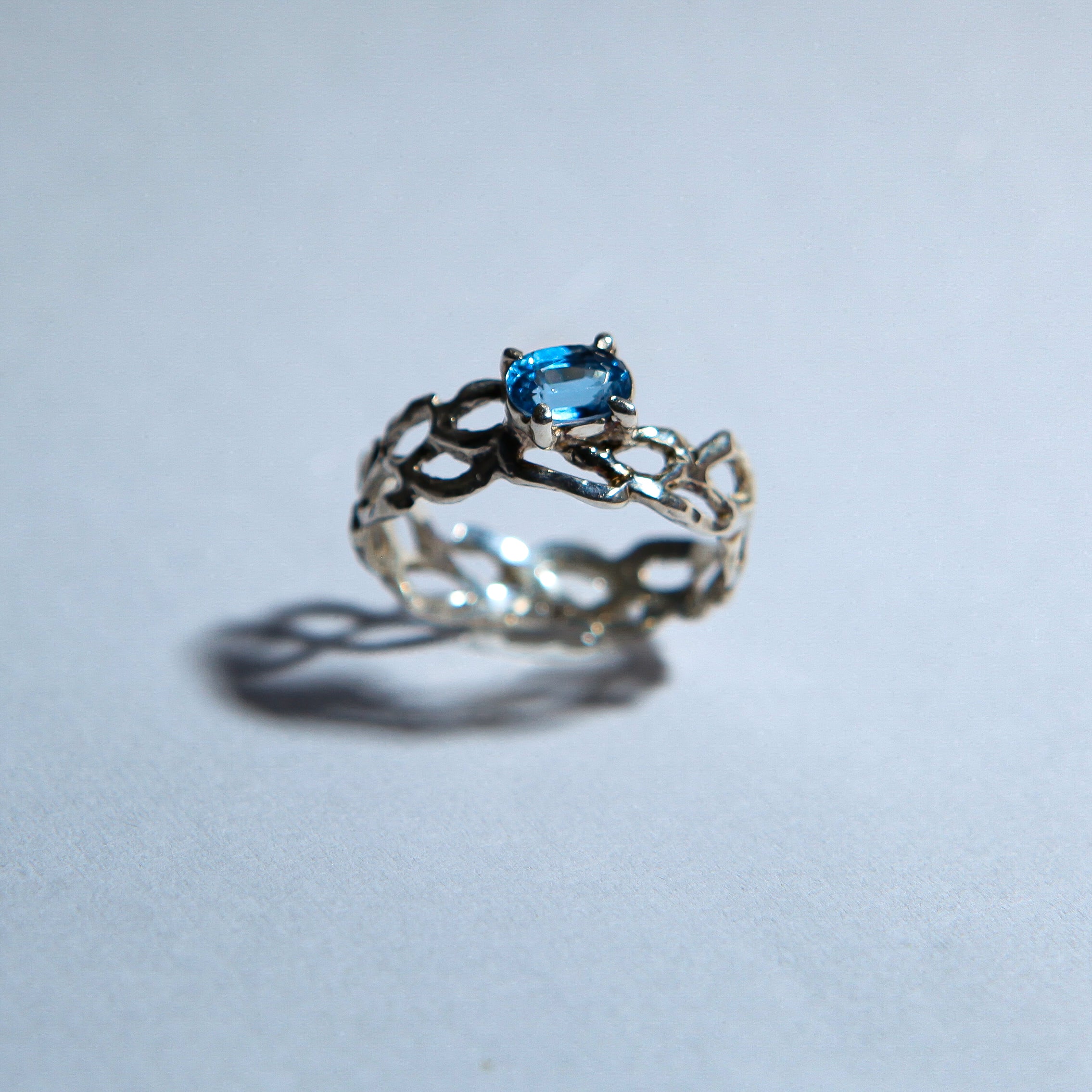 Lacey with blue zircon