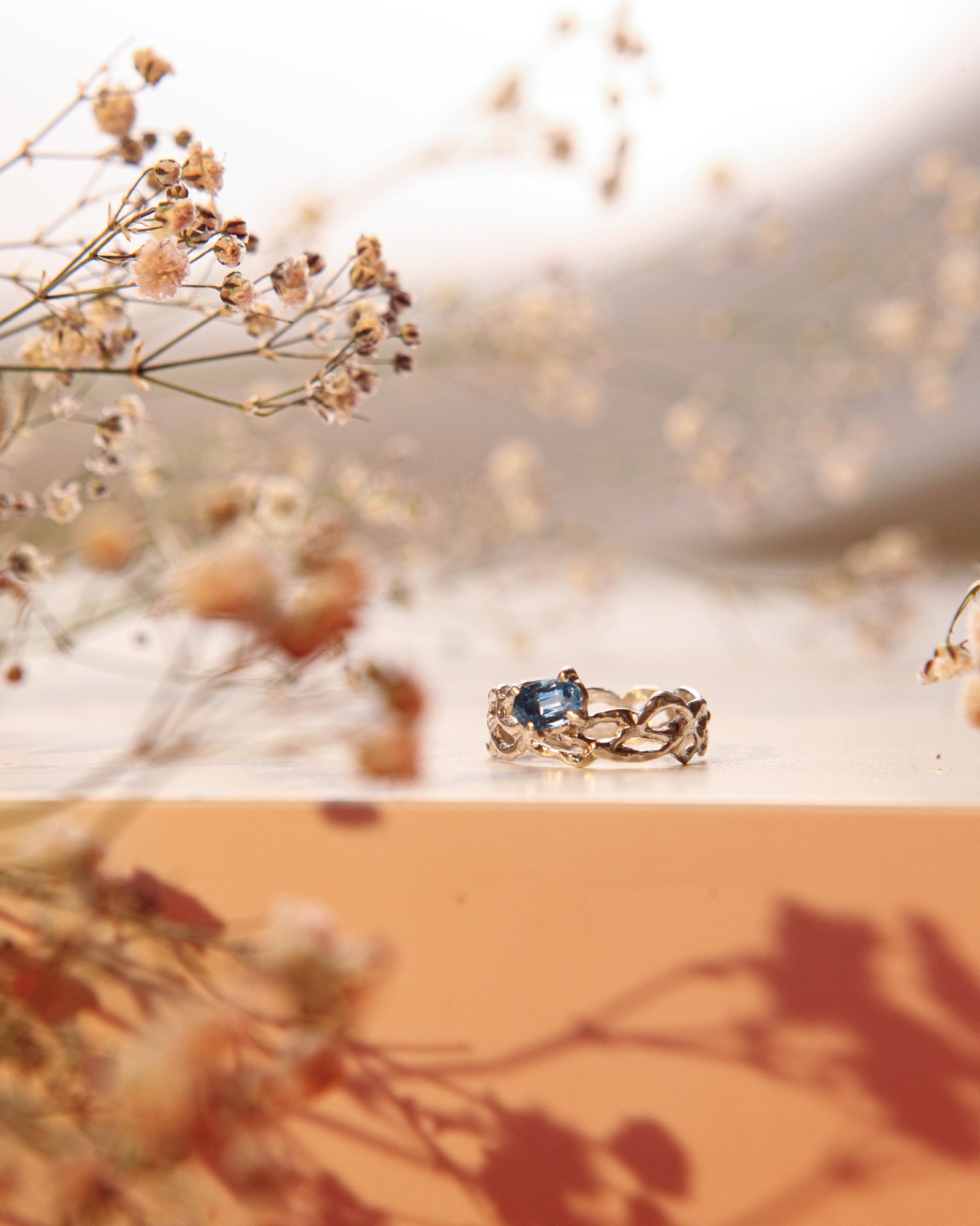 Lacey with blue zircon