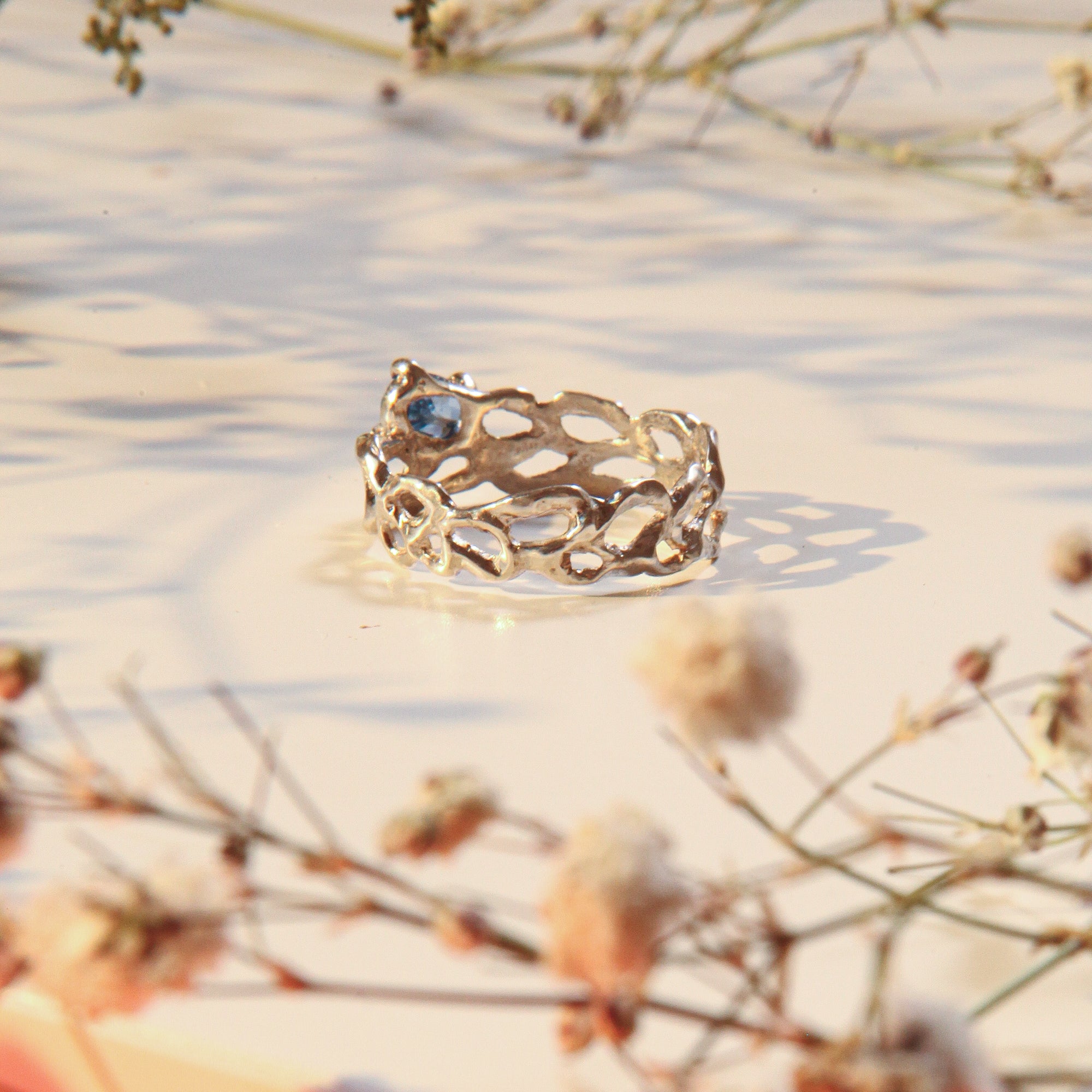 Lacey with blue zircon