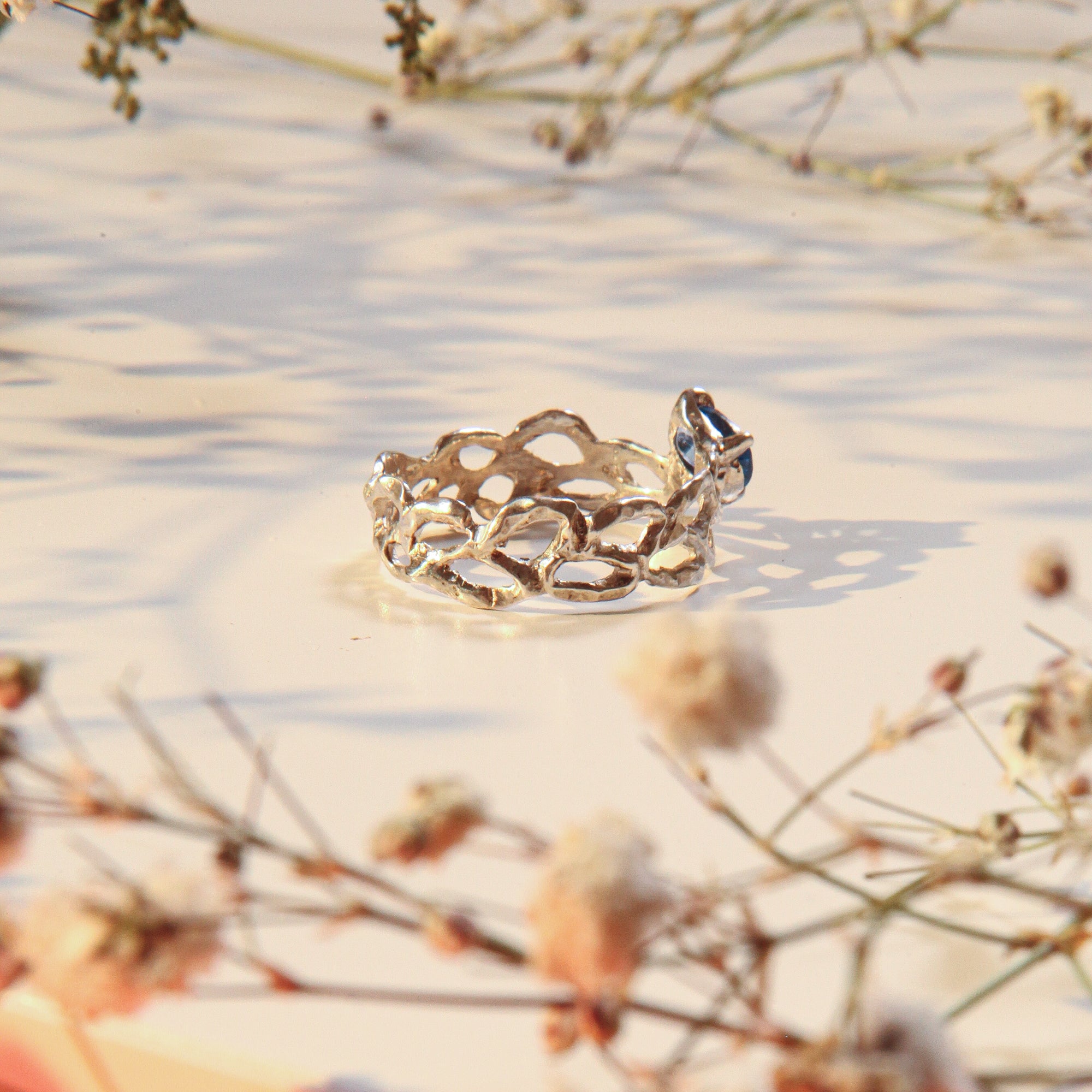 Lacey with blue zircon