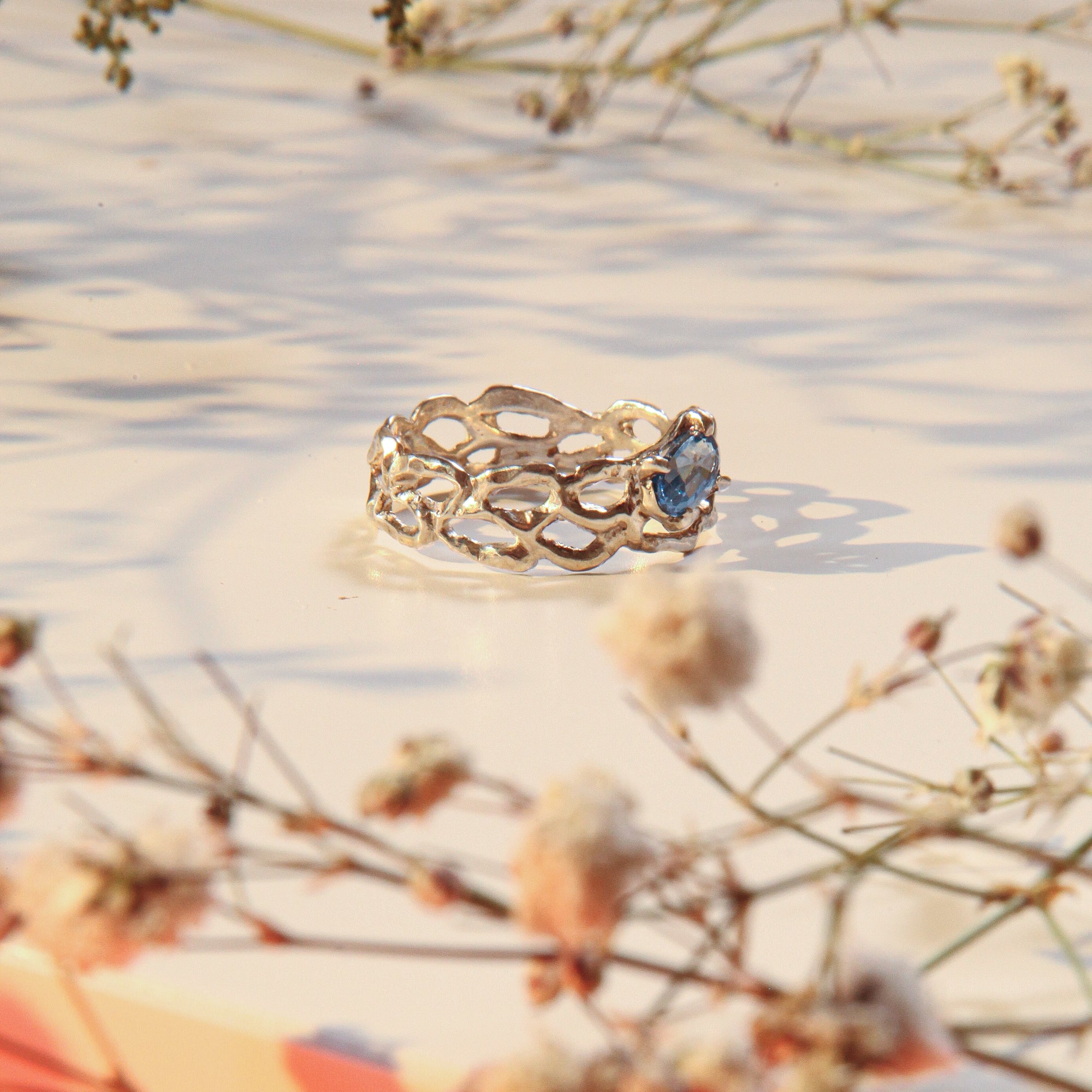 Lacey with blue zircon